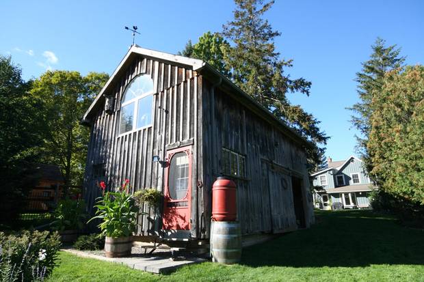 Because the 90-year-old structure is located on a flood plain, tearing it down would required expensive landscaping to redirect the water, so the barn was saved instead.