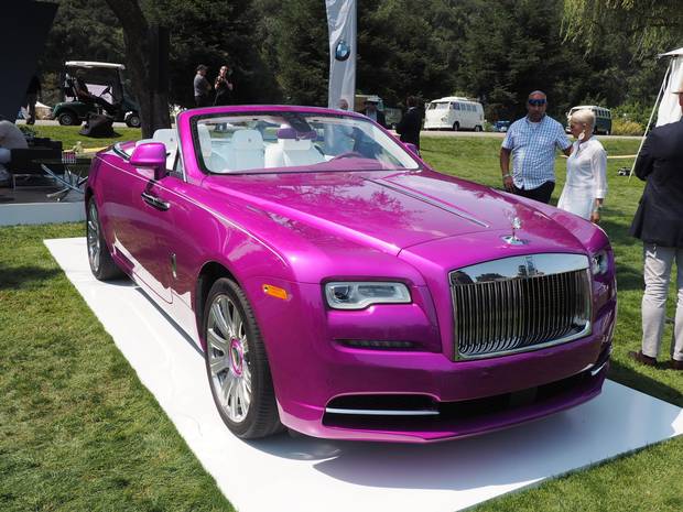 A bright fuschia-coloured Rolls Royce with pure-white interior was just one of the many head-turning new cars on display.