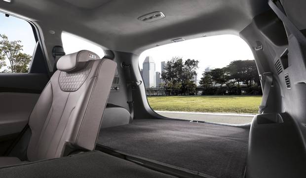 The rear seats can be moved forward for a little extra room.