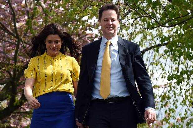 Liberal Democrat Leader Nick Clegg and his wife, Miriam Gonzalez Durantez, arrive to vote at Hall Park centre polling station in Sheffield, England, on May 7, 2015.