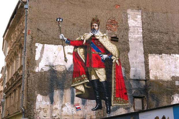 Olomouc is best known for its Baroque architecture, but street art like this mural of a king holding a selfie-stick in place of a scepter, prove this Czech university city doesn't take itself too seriously.