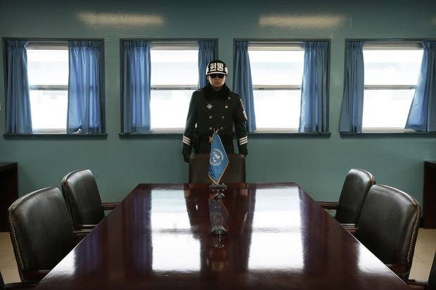 A South Korean army soldier stands at the Military Armistice Committee meeting room on Feb. 4, 2015, at the border village of Panmunjom, South Korea, which separates the two Koreas.