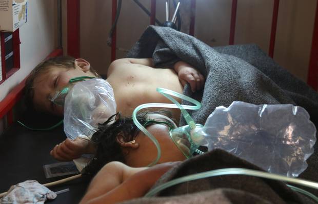 Syrian children receive treatment on Tuesday at a hospital in Maaret al-Noman after a gas attack in Khan Sheikhoun.