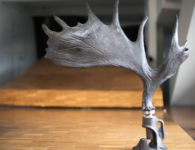 Detail showing a lamp in the shape of a moose antler, seen in Claude Cormier home in Montreal, Quebec November 16, 2017.
