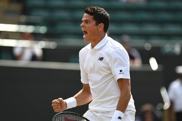 Milos Raonic of Canada celebrates victory during the Men's Singles Quarter Finals match against Sam Querrey of The United States on day nine of the Wimbledon Lawn Tennis Championships at the All England Lawn Tennis and Croquet Club on July 6, 2016 in London, England.