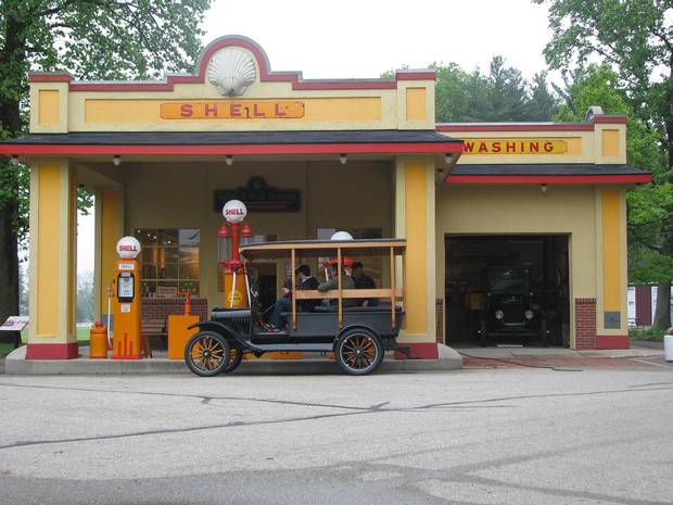 A 1919 Model T sits at a 1930s gas station at the Gilmore Car Museum.