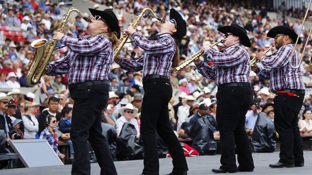The Calgary Stampede show band plays for fans before the start of the rodeo in Calgary, Alberta, July 5, 2015. 