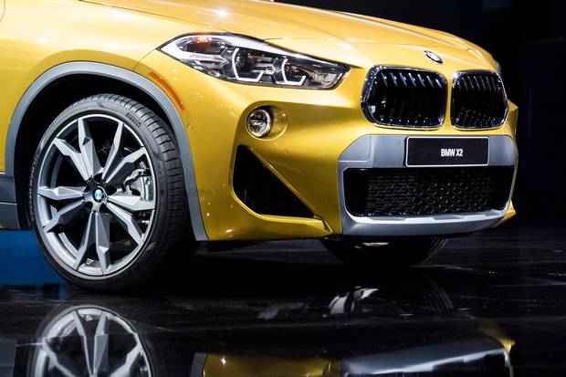 A close-up photo of the new BMW X2 on display in Detroit.