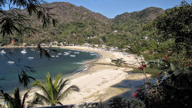 The beach at Yelapa lets you hike into the mountains to a waterfall or go horseback riding. 
