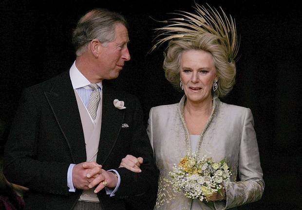 Prince Charles and The Duchess of Cornwall leave St. George's Chapel in Windsor Castle, southern England, following the Service of Prayer and Dedication following their marriage, April 9, 2005. Prince Charles and his long-term partner Camilla Parker Bowles, who became Her Royal Highness the Duchess of Cornwall on their marriage, married on Saturday in a low-key ceremony.
