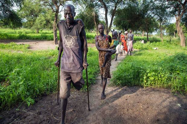 A displaced family walks in Padding, South Sudan, on July 4, 2017. Roughly four million people have been forced to leave their homes, according to the Norwegian Refugee Council. 