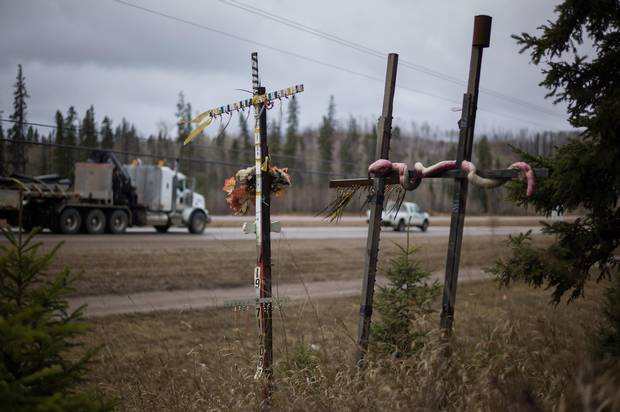 A roadside memorial is seen along highway 63, just north of Fort McMurray.