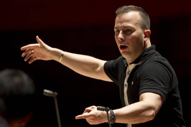 In this Oct. 17, 2012, file photo, the Philadelphia Orchestra rehearses with its new music director and conductor Yannick Nézet-Séguin at the Kimmel Center, in Philadelphia. Nézet-Séguin will succeed James Levine as music director of the Metropolitan Opera but will not take over until the 2020-21 season.