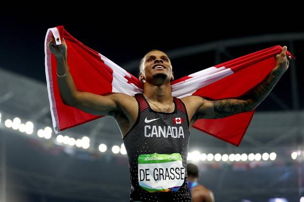Canada’s Andre De Grasse celebrates after placing third at the Olympic men’s 100-meter on Aug. 14, 2016.