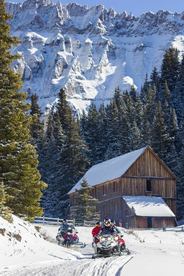 Weather permitting, Telluride Outside offers snowmobile day trips up to the ghost town of Alta.