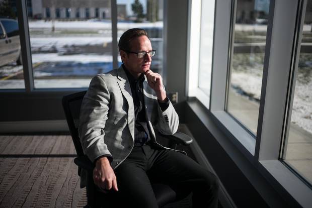 Andrew Sharpe, president of IO Industries, sits at the company’s new headquarters in London, Ont. 