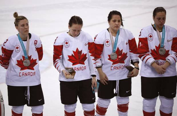 Jocelyne Larocque holds her silver medal during the medal ceremony after the women's hockey gold medal game on Feb. 22, 2018 in Pyeongchang.