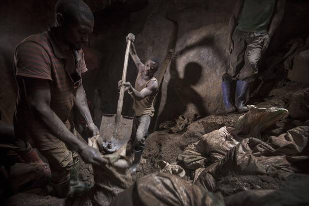 Miners in underground tunnels and mine shafts at work in the Unipe Nikupe gold mine, June 2017.
