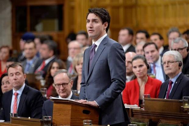 Prime Minister Justin Trudeau makes a formal apology to individuals harmed by federal legislation, policies, and practices that led to the oppression of and discrimination against LGBTQ2 people in Canada, in the House of Commons in Ottawa, Tuesday, Nov.28, 2017. 