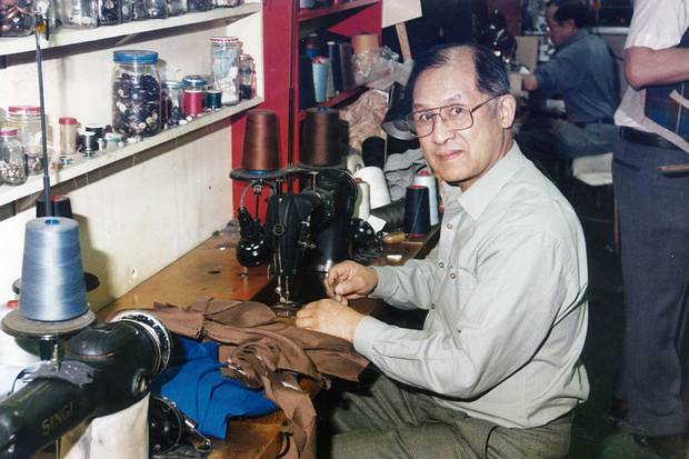 Bill Wong sits at his sewing machine in the Modernize tailor shop. Mr. wong died of heart failure last month, aged 95, after a decades-long tenure at a family business that became a Vancouver institution.