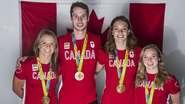 Left to right: Canadian gold medalists Erica Wiebe, Derek Drouin, Penny Oleksiak and Rosie MacLennan on August 21, 2016 at the Rio 2016 Summer Olympics.