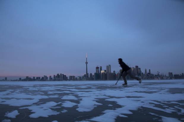 Maya Mittelstaedt skates across the frozen Toronto Harbour on Jan. 2, 2018.