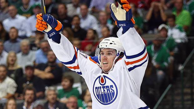 Connor McDavid, celebrating his first career NHL goal in October, 2015, has changed the way Oilers fans view their hockey team.