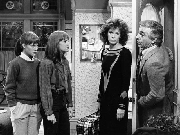 Art Foster (played by Donnelly Rhodes, right,) with daughters Allison and Kate (Liz Sagal, left and Jean Sagal, centre,) and fiancee Beth (Patricia Richardson) in the 1984 NBC-TV's comedy series Double Trouble.