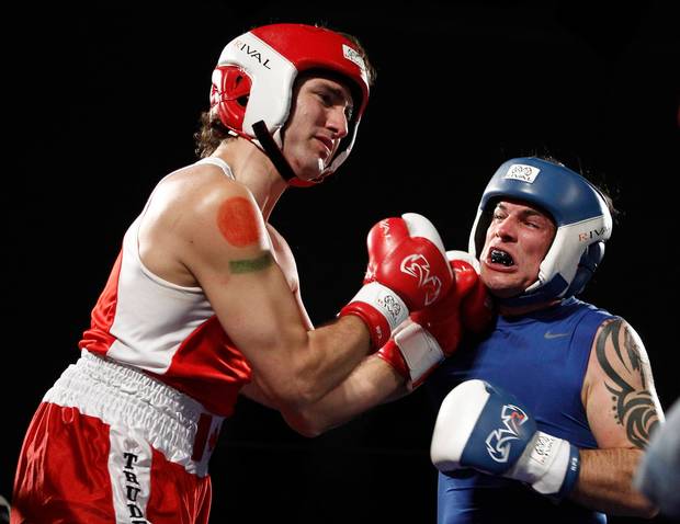 Justin Trudeau and Conservative Senator Patrick Brazeau fight during their charity boxing match in Ottawa on March 31, 2012.