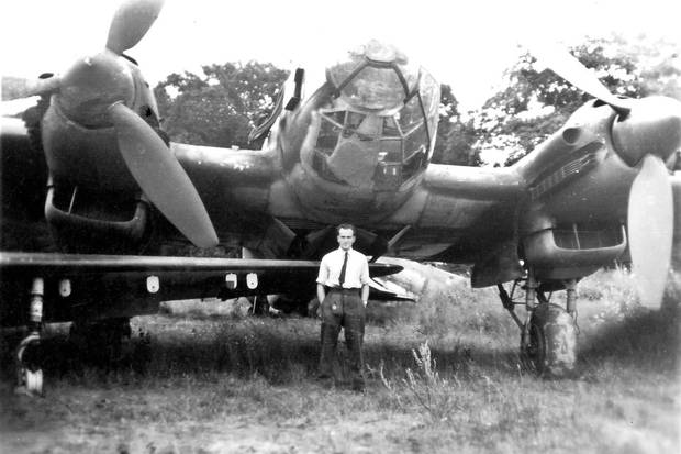 May, 1945: Mr. Smith stands by his bomber during the Second World War.