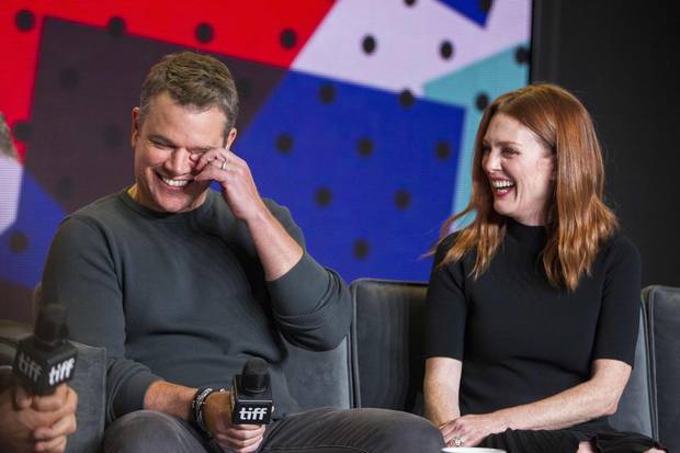 Matt Damon and Julianne Moore share a laugh during a photo call for The Current War.