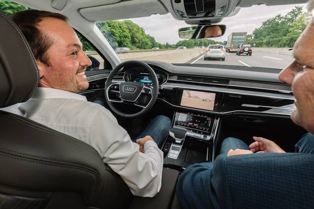 Mark Richardson rides shotgun with Audi engineer Christopher Demiral in a 'conditionally automated' Audi A8.