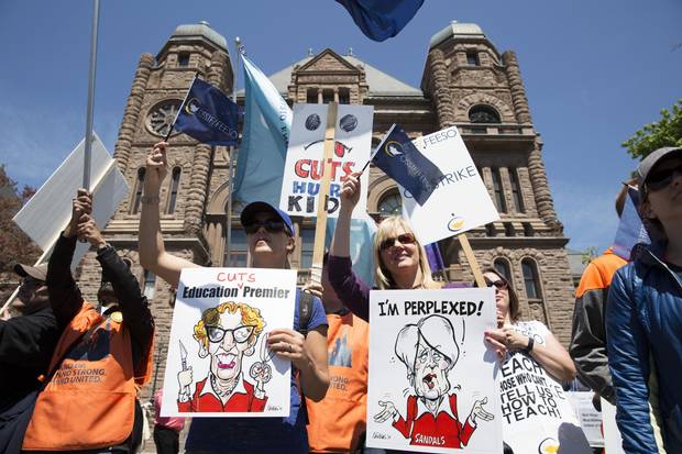 Teachers on strike rally outside of Queen’s Park in Toronto on May 14, 2015.