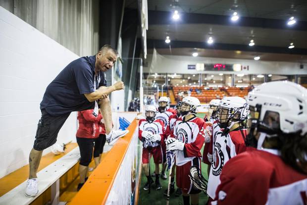 Team Ontario coach Pat Pembleton speaks to his team before playing Team BC during their under 19 women's lacrosse match at the Iroquois Lacrosse Arena during 2017 North American Indigenous Games in Toronto, Monday July 17, 2017.