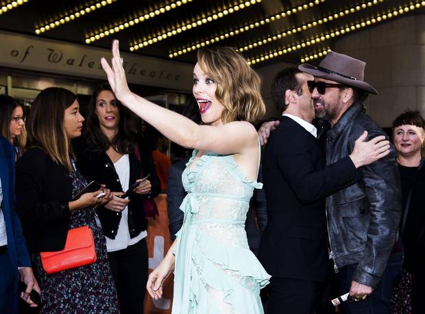 Canadian Rachel McAdams waves to fans as she walks the red carpet for her movie Disobedience.