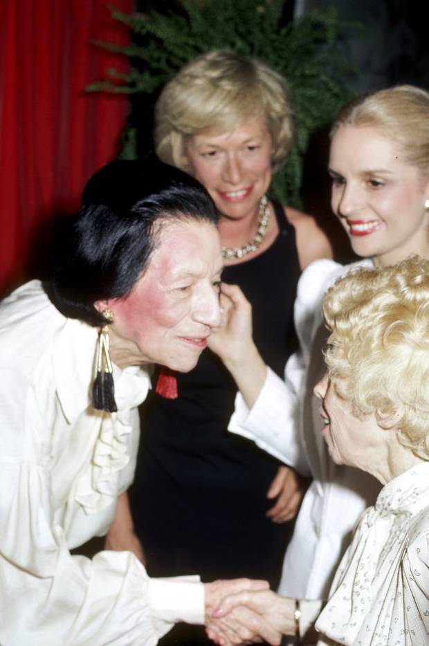 At former Vogue editor Diana Vreeland’s book launch at Mortimer’s restaurant in 1984, Herrera (second right) is pictured with Vreeland (left) and socialite Iris Love (middle). 