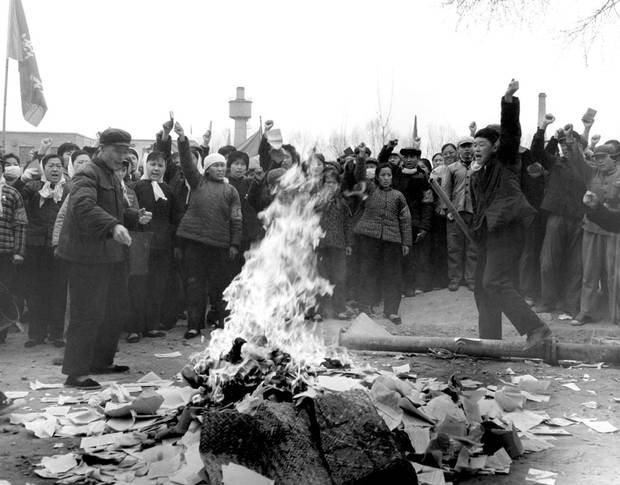 Chinese people burn books in 1966, during the country’s Cultural Revolution, a state-led campaign to destroy literature, art and architecture deemed not revolutionary or modern enough.
