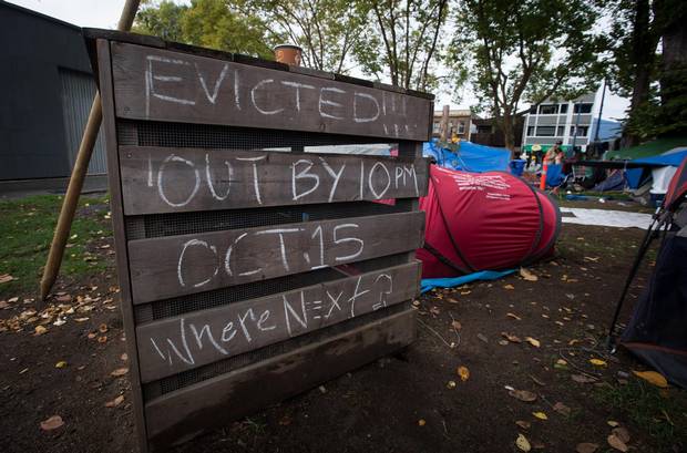A notice about the eviction is written at the tent city at Oppenheimer Park.
