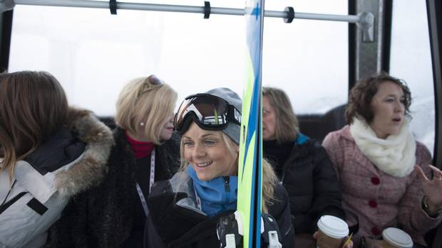 Austrian pro skier and filmmaker Sandra Lahnsteiner, middle, on the Whistler Village Gondola with other attendees of the Women on Top breakfast 