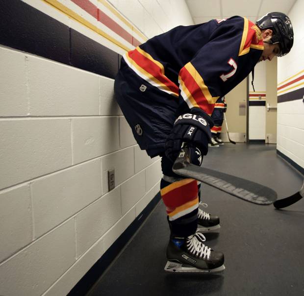Steve Montador #7 of the Florida Panthers and teammate David Booth #46 take a minute before going out to the ice to play the Buffalo Sabres at the Bank Atlantic Center on March 15, 2007 in Sunrise, Florida.