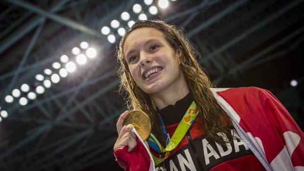 Penny Oleksiak after she won gold in Women's 100m Freestyle Final at Olympic Aquatics Stadium during Rio Olympics August 11, 2016.