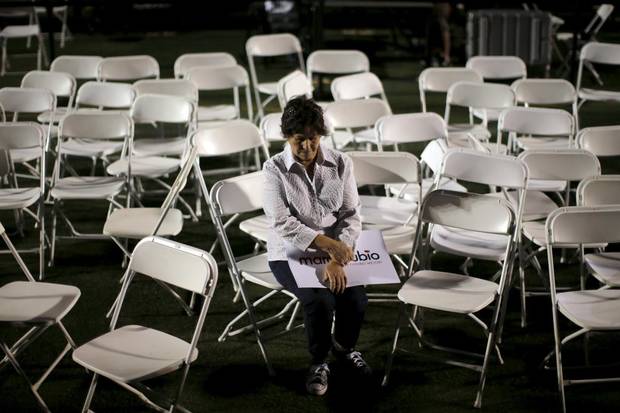 A Marco Rubio supporter sits after a campaign rally in Miami March 9. Pundits believe Mr. Rubio‘s chances in the campaign hinge on winning his home state of Florida on March 15.