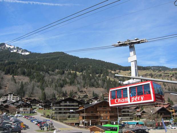 From the village of Champéry, the tram lifts off to snowy slopes. 
