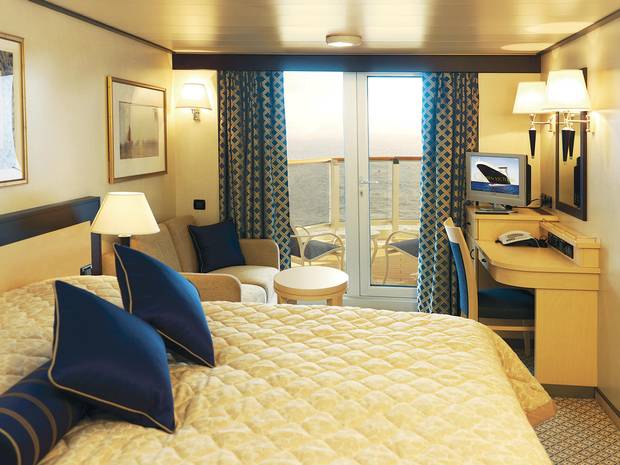 A balcony stateroom aboard the MS Queen Victoria.