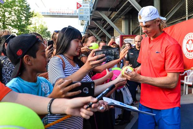 Shapovalov signs autographs for fans after defeating Rogerio Dutra Silva of Brazil on day five of the Rogers Cup on Aug. 8, 2017 in Montreal.