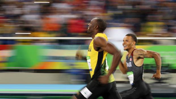 Bolt and De Grasse in the semi-final race: De Grasse ran a personal best of 19.80 seconds, while Bolt ran 19.78.
