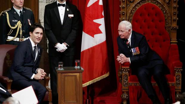Governor-General David Johnston, right, chats with Prime Minister Justin Trudeau ahead of the delivery of the Speech from the Throne in the Senate chamber on Dec. 4, 2015.