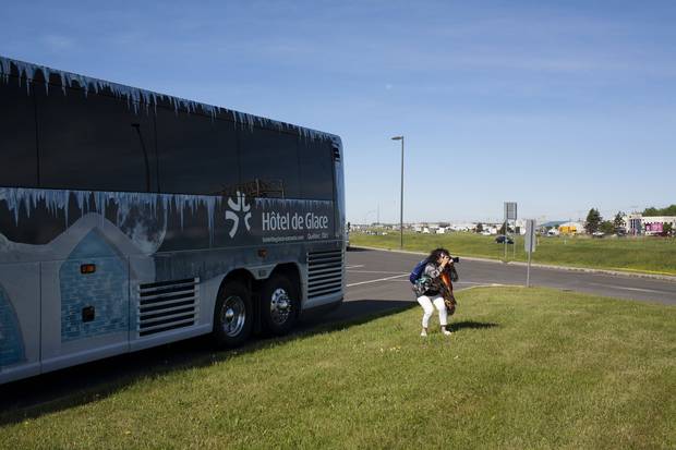 Outside Quebec City: One of the passengers takes a photo at a rest stop.