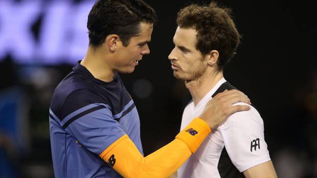 Andy Murray of Great Britain is congratulated by Milos Raonic of Canada after their semi final match at the Queen's Cup.