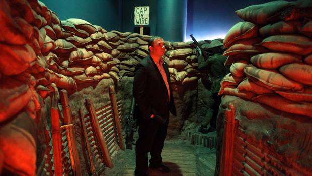 Historian Tim Cook stands in mock trenches on display at the Canadian War Museum’s Vimy Ridge exhibit in Ottawa on Monday.